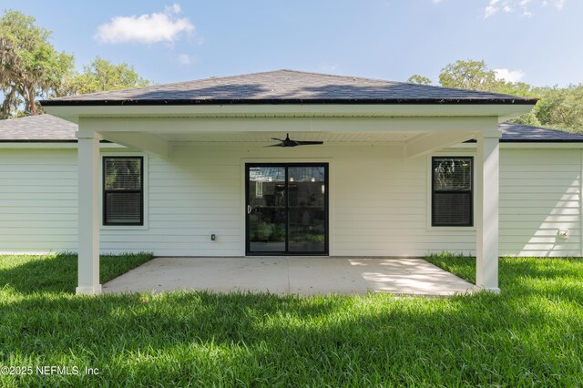 1114 Nantucket Ave, Jacksonville, FL 32233 - back of property featuring ceiling fan, a yard, and a patio area