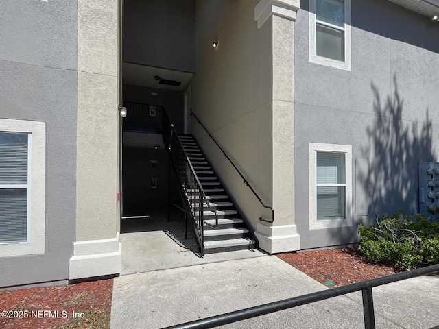 5151 Playpen Dr Unit 7-2, Jacksonville, FL 32210 - property entrance featuring stucco siding