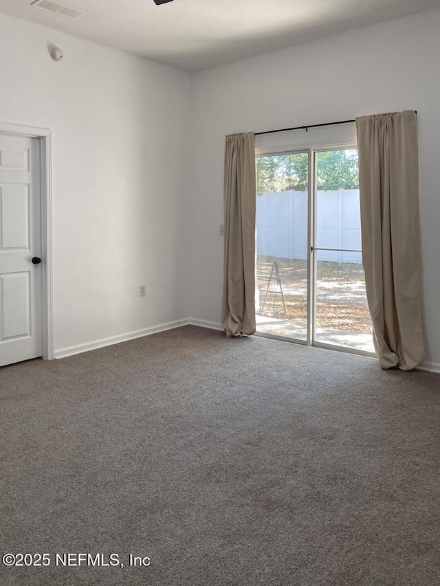 5151 Playpen Dr Unit 7-2, Jacksonville, FL 32210 - carpeted spare room with baseboards