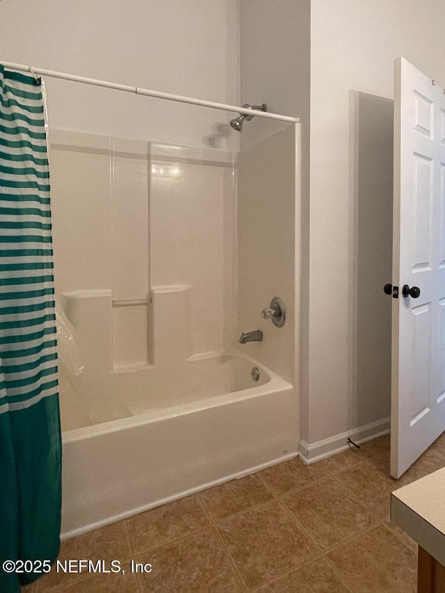 5151 Playpen Dr Unit 7-2, Jacksonville, FL 32210 - full bath featuring shower / bath combination with curtain, tile patterned floors, and vanity