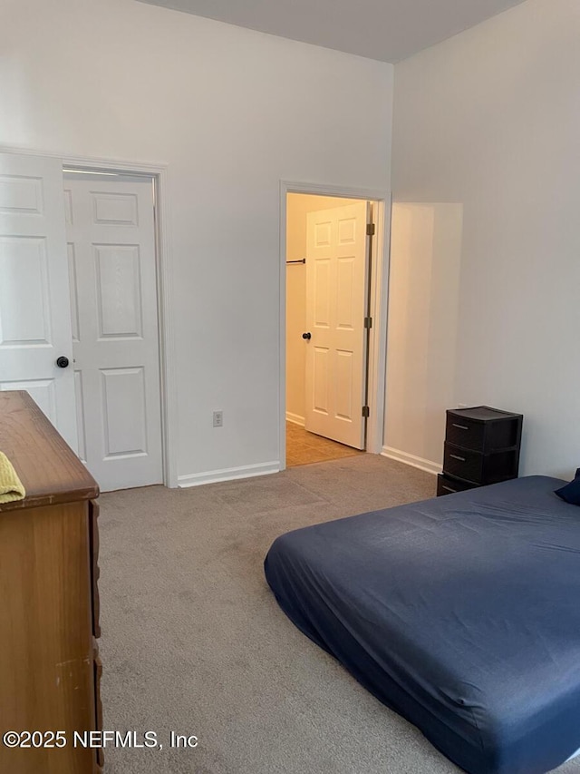 5151 Playpen Dr Unit 7-2, Jacksonville, FL 32210 - bedroom with carpet floors and baseboards