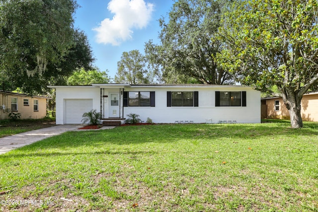 6552 Shady Oak Dr, Jacksonville, FL 32277 - single story home featuring a garage, driveway, and a front yard