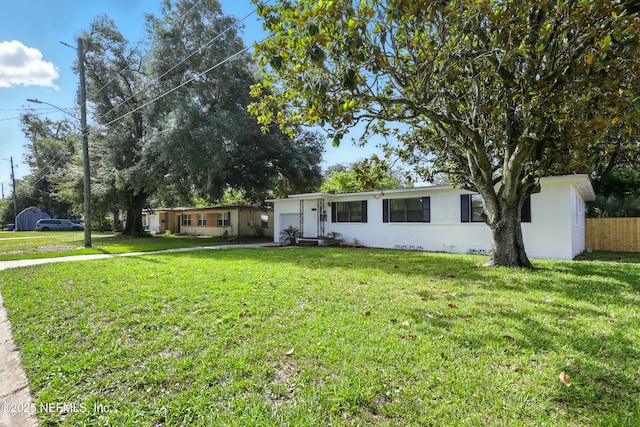 6552 Shady Oak Dr, Jacksonville, FL 32277 - ranch-style home with an attached garage