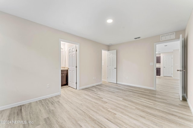 5428 Chenango Blvd, Jacksonville, FL 32254 - unfurnished bedroom with light wood-type flooring and ensuite bath