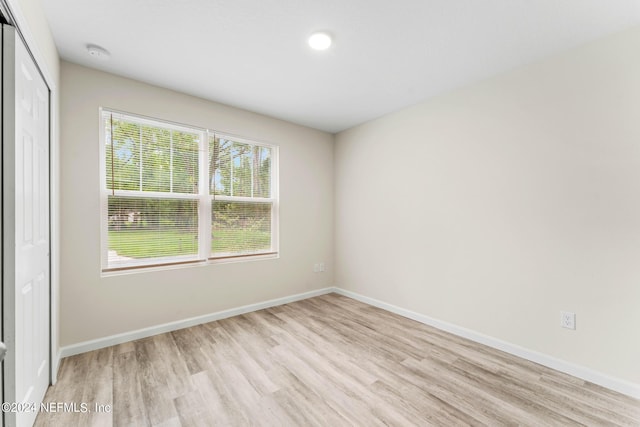 5428 Chenango Blvd, Jacksonville, FL 32254 - unfurnished room featuring light wood-style floors and a smoke detector