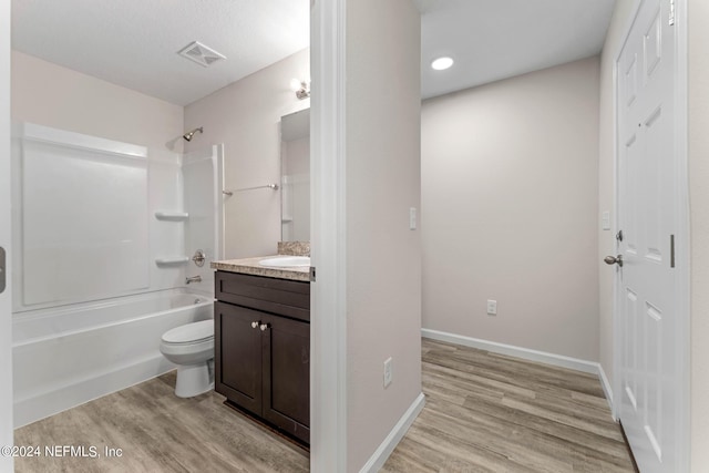 5428 Chenango Blvd, Jacksonville, FL 32254 - full bath featuring vanity, wood finished floors, and shower / bath combination