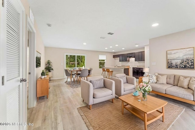 5428 Chenango Blvd, Jacksonville, FL 32254 - living area with light wood finished floors and recessed lighting