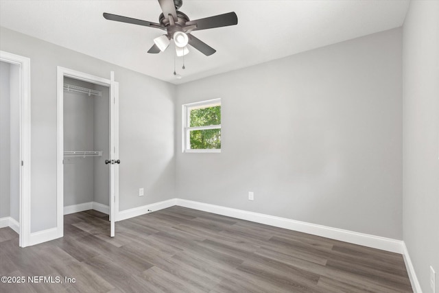 110 Pleasant Dr, East Palatka, FL 32131 - unfurnished bedroom with a closet, wood finished floors, and ceiling fan