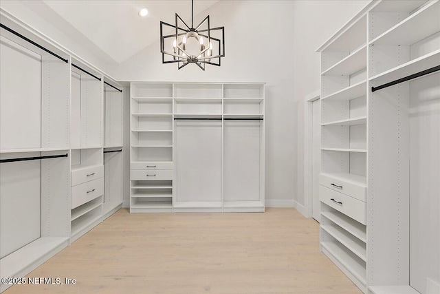 172 Laurel Ln, Ponte Vedra Beach, FL 32082 - spacious closet with light wood-style floors, a chandelier, and lofted ceiling