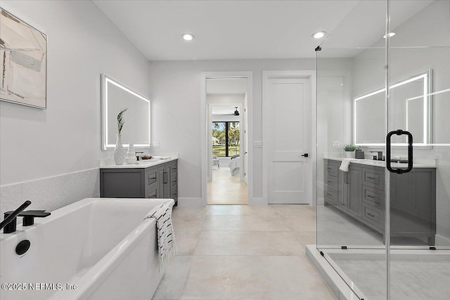 172 Laurel Ln, Ponte Vedra Beach, FL 32082 - bathroom featuring vanity, a bathtub, recessed lighting, tile patterned floors, and a stall shower