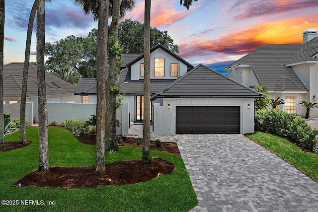 172 Laurel Ln, Ponte Vedra Beach, FL 32082 - view of front of property featuring a garage, decorative driveway, and stucco siding