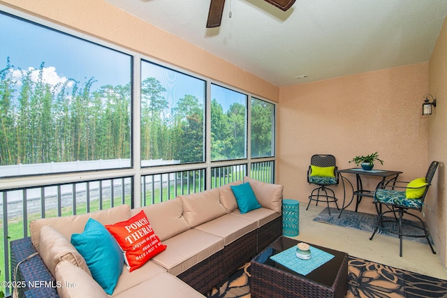 11890 Surfbird Cir Unit 42E, Jacksonville, FL 32256 - sunroom with outdoor lounge area and ceiling fan