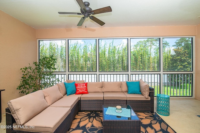 11890 Surfbird Cir Unit 42E, Jacksonville, FL 32256 - sunroom featuring a ceiling fan and an outdoor living space