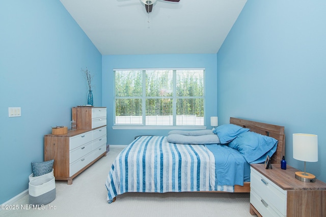 11890 Surfbird Cir Unit 42E, Jacksonville, FL 32256 - bedroom with light colored carpet, lofted ceiling, and ceiling fan