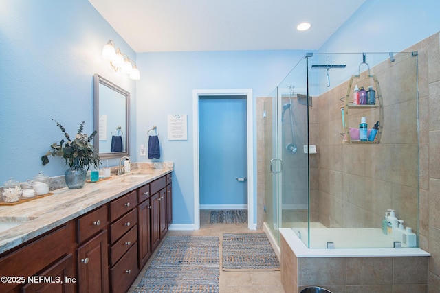 11890 Surfbird Cir Unit 42E, Jacksonville, FL 32256 - full bath with a stall shower, double vanity, and tile patterned flooring