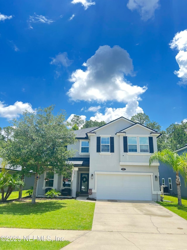 190 Colorado Springs Way, Saint Augustine, FL 32092 - traditional-style home featuring a garage, stucco siding, concrete driveway, and a front yard