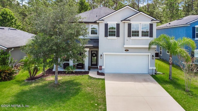 190 Colorado Springs Way, Saint Augustine, FL 32092 - view of front of house featuring stucco siding, an attached garage, driveway, a front lawn, and roof with shingles