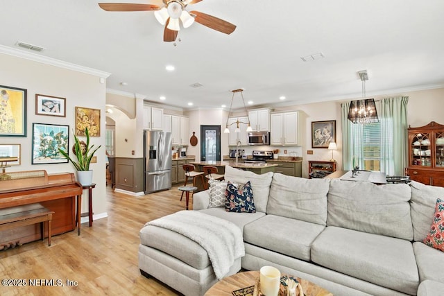 190 Colorado Springs Way, Saint Augustine, FL 32092 - living area with ceiling fan, crown molding, recessed lighting, light wood-style flooring, and a chandelier