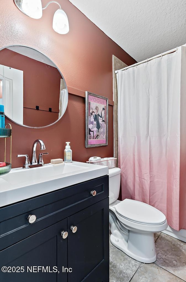 190 Colorado Springs Way, Saint Augustine, FL 32092 - bathroom with vanity, a shower with shower curtain, and a textured ceiling