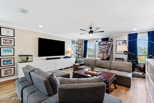 190 Colorado Springs Way, Saint Augustine, FL 32092 - living room featuring crown molding, a ceiling fan, wood finished floors, healthy amount of natural light, and recessed lighting