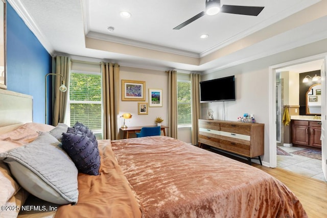 190 Colorado Springs Way, Saint Augustine, FL 32092 - bedroom with ornamental molding, multiple windows, a tray ceiling, light wood finished floors, and recessed lighting
