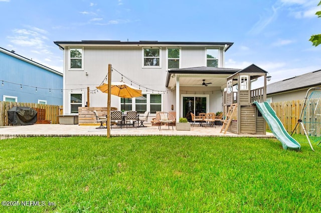 190 Colorado Springs Way, Saint Augustine, FL 32092 - rear view of house with a playground, a patio area, a fenced backyard, and ceiling fan
