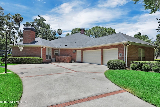 101 Royal Lagoon Ct, Ponte Vedra Beach, FL 32082 - ranch-style house with a chimney, brick siding, and an attached garage