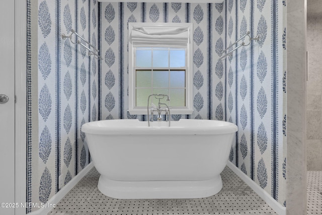 101 Royal Lagoon Ct, Ponte Vedra Beach, FL 32082 - bathroom featuring wallpapered walls and a freestanding bath