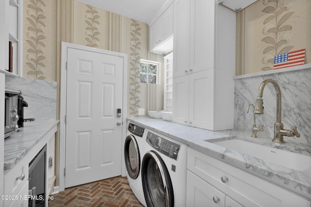 101 Royal Lagoon Ct, Ponte Vedra Beach, FL 32082 - laundry room with washer and clothes dryer, brick flooring, and cabinet space