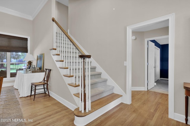 101 Royal Lagoon Ct, Ponte Vedra Beach, FL 32082 - stairway with wood finished floors, ornamental molding, and a towering ceiling