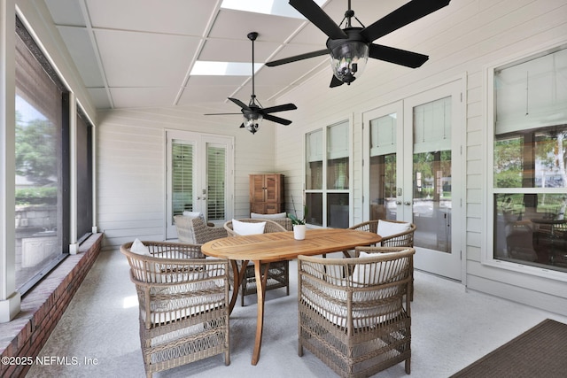 101 Royal Lagoon Ct, Ponte Vedra Beach, FL 32082 - sunroom featuring french doors, wooden walls, lofted ceiling, and a skylight