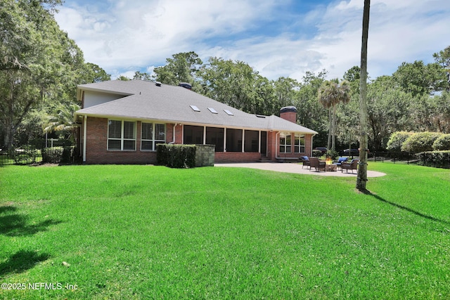 101 Royal Lagoon Ct, Ponte Vedra Beach, FL 32082 - back of property with a patio, a chimney, a sunroom, and brick siding