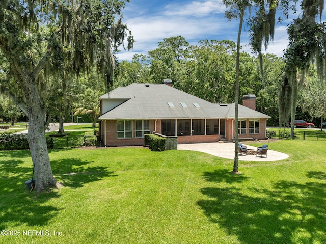 101 Royal Lagoon Ct, Ponte Vedra Beach, FL 32082 - back of property with a chimney, a patio area, a sunroom, and brick siding