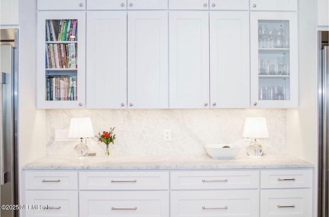 101 Royal Lagoon Ct, Ponte Vedra Beach, FL 32082 - bar featuring stainless steel fridge and backsplash