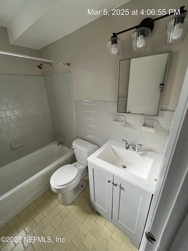 1624 36th St Unit 1-4, Jacksonville, FL 32209 - bathroom featuring vanity, shower / washtub combination, tile patterned flooring, and tile walls
