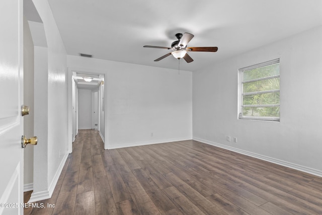 7314 Hielo Dr, Jacksonville, FL 32211 - unfurnished room with dark wood-type flooring and ceiling fan