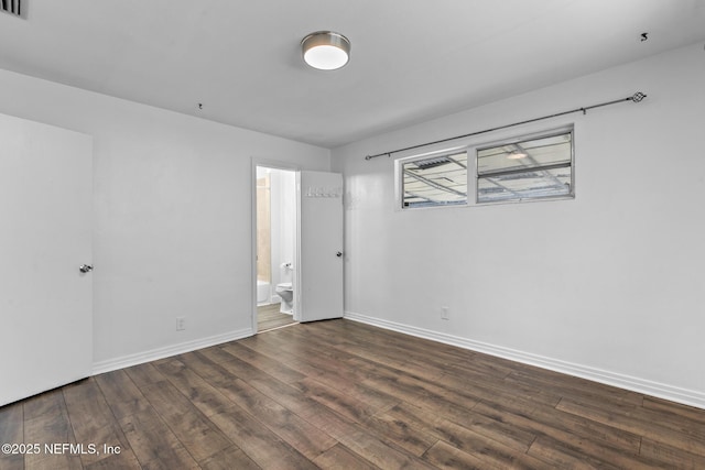 7314 Hielo Dr, Jacksonville, FL 32211 - unfurnished bedroom with wood finished floors and connected bathroom