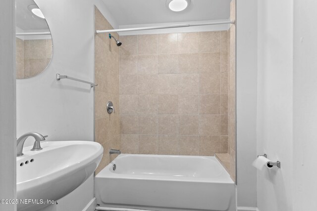 7314 Hielo Dr, Jacksonville, FL 32211 - full bathroom with a sink and bathing tub / shower combination