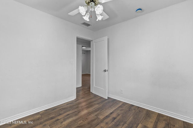 7314 Hielo Dr, Jacksonville, FL 32211 - empty room with ceiling fan, dark wood finished floors, and a smoke detector