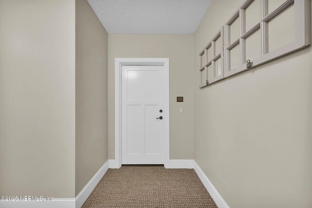 2525 College St Unit 1305, Jacksonville, FL 32204 - doorway featuring carpet floors and a textured ceiling