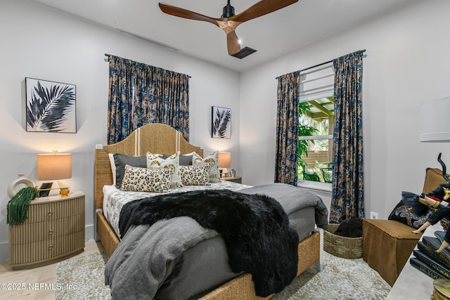 74 Sanford St, Saint Augustine, FL 32084 - bedroom with light wood-type flooring and ceiling fan