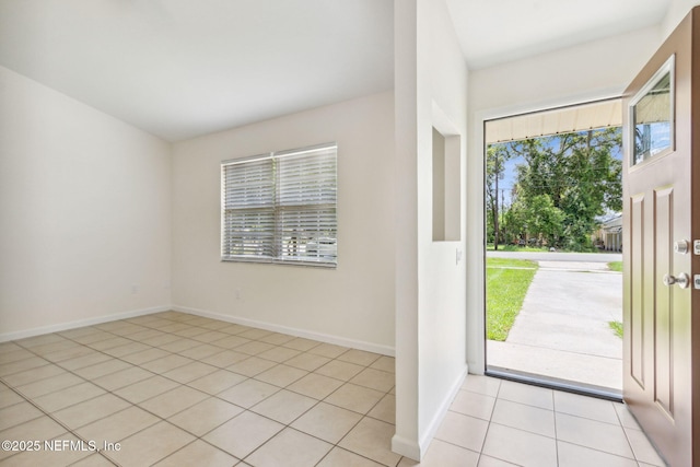 423 S Blvd, Macclenny, FL 32063 - entryway with light tile patterned floors and baseboards