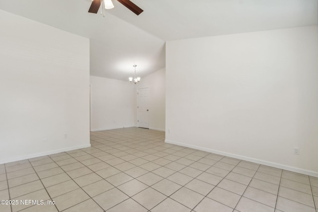 423 S Blvd, Macclenny, FL 32063 - empty room featuring ceiling fan, a chandelier, lofted ceiling, and light tile patterned flooring