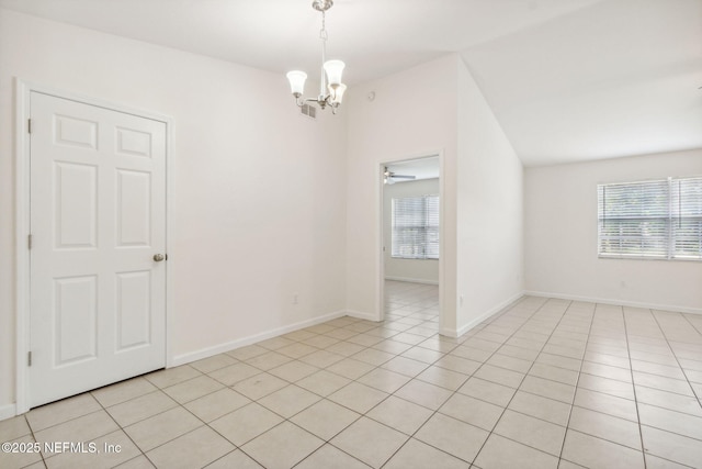 423 S Blvd, Macclenny, FL 32063 - empty room with healthy amount of natural light, a chandelier, and light tile patterned floors