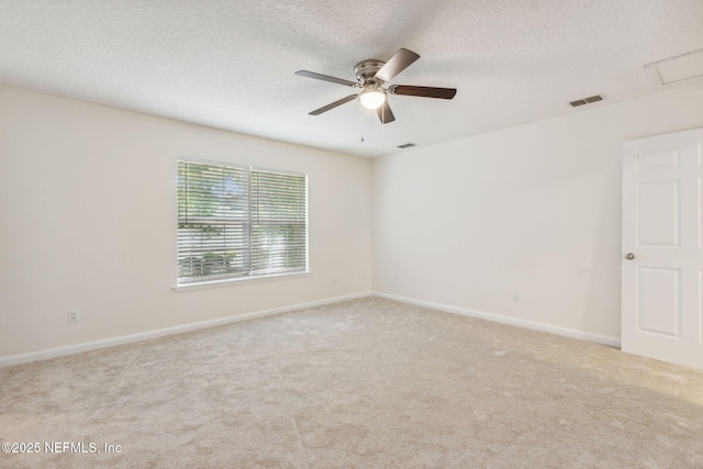 423 S Blvd, Macclenny, FL 32063 - spare room featuring carpet flooring, ceiling fan, and a textured ceiling