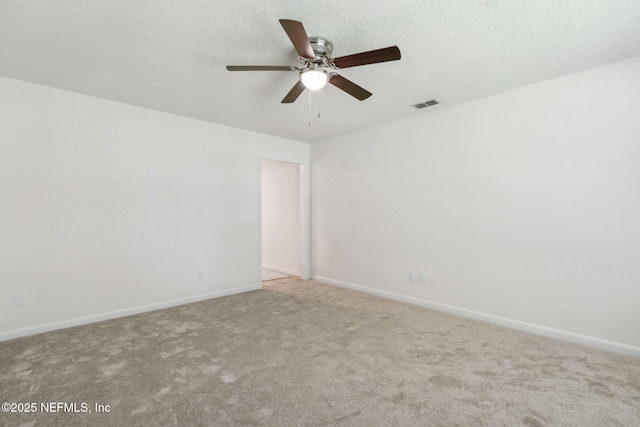 423 S Blvd, Macclenny, FL 32063 - carpeted spare room with a ceiling fan and a textured ceiling