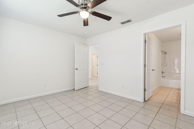 423 S Blvd, Macclenny, FL 32063 - unfurnished bedroom featuring light tile patterned floors and ceiling fan