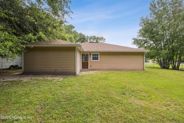 423 S Blvd, Macclenny, FL 32063 - rear view of house with roof with shingles