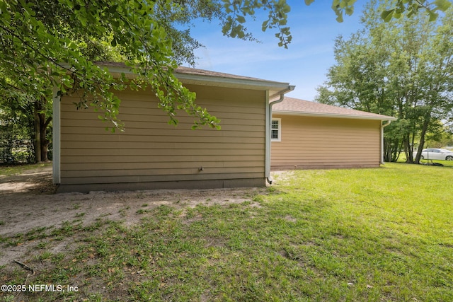 423 S Blvd, Macclenny, FL 32063 - view of home's exterior featuring a yard