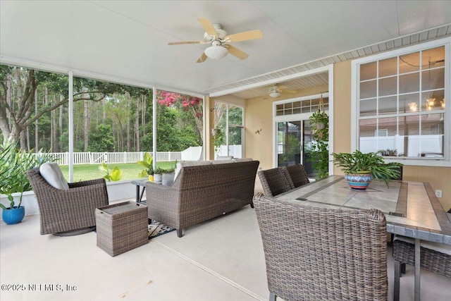 573 N Bridgestone Ave, Saint Johns, FL 32259 - sunroom with a ceiling fan, outdoor dining space, and an outdoor living space